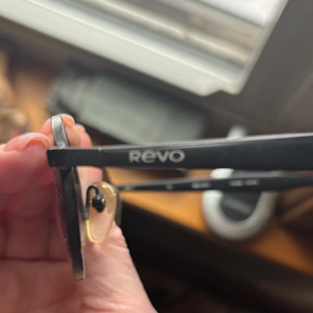Vintage REVO Sunglasses with Black Frame and Vibrant Mirror Blue Lenses - Picture 3 of 5